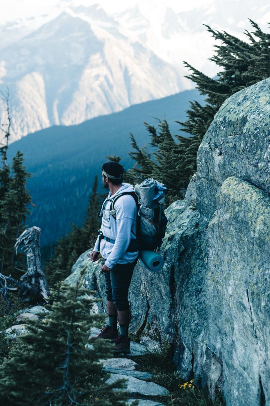 a man standing on the mountain — Resend eSIM QR Code: tell it about the trip, get the answer in under a minute.