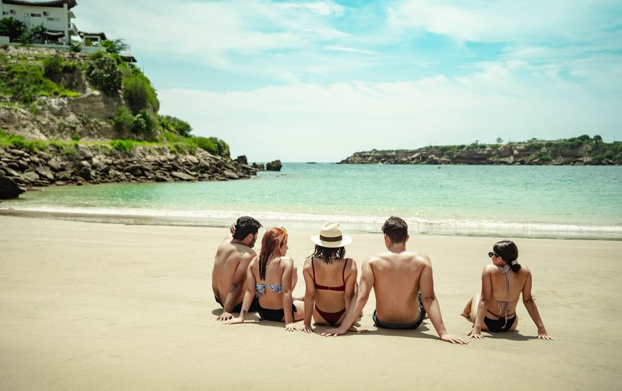 a group of friends on the seashore