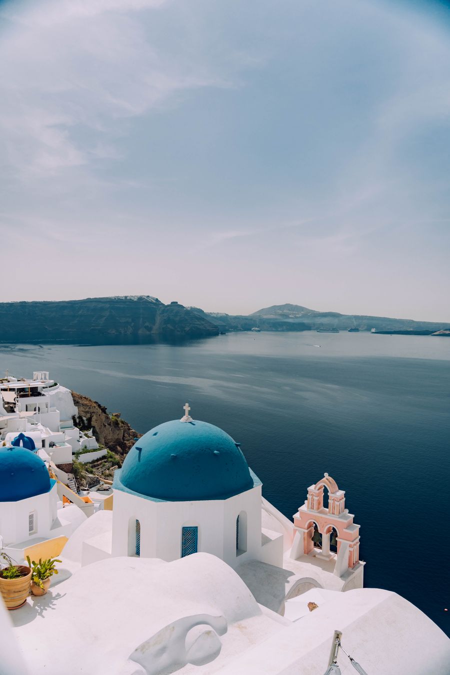 dome of a building on santorini greece — From Airport Connectivity's answer to checkout is a short, well-lit path.