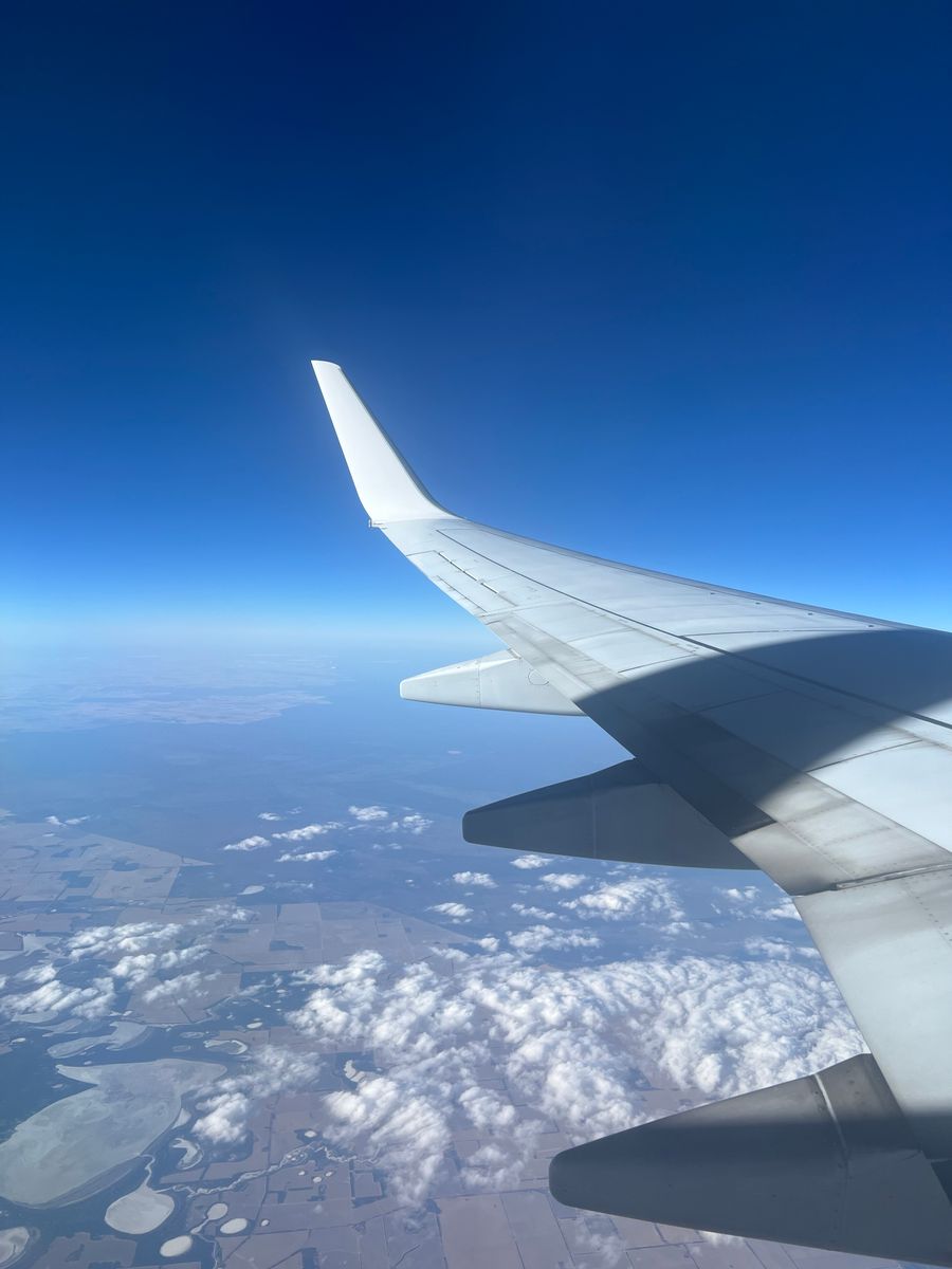 wing of flying airplane — Free Wi-Fi Finder accepts your trip details and hands back a clear recommendation.
