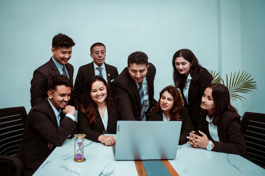 a group of people with a laptop — Every run of this tool is free — no credits, no paywall, no expiring trial.