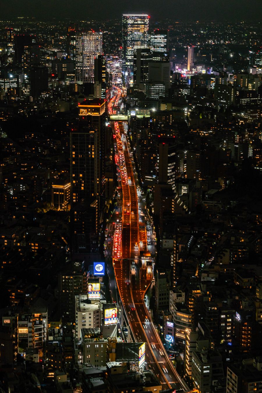 tokyo night cityscape with busy traffic