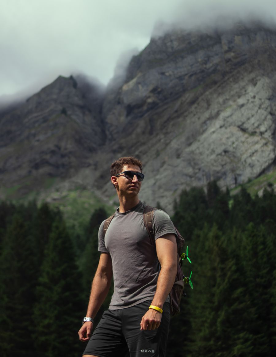 adventurous hiker exploring misty mountain trail
