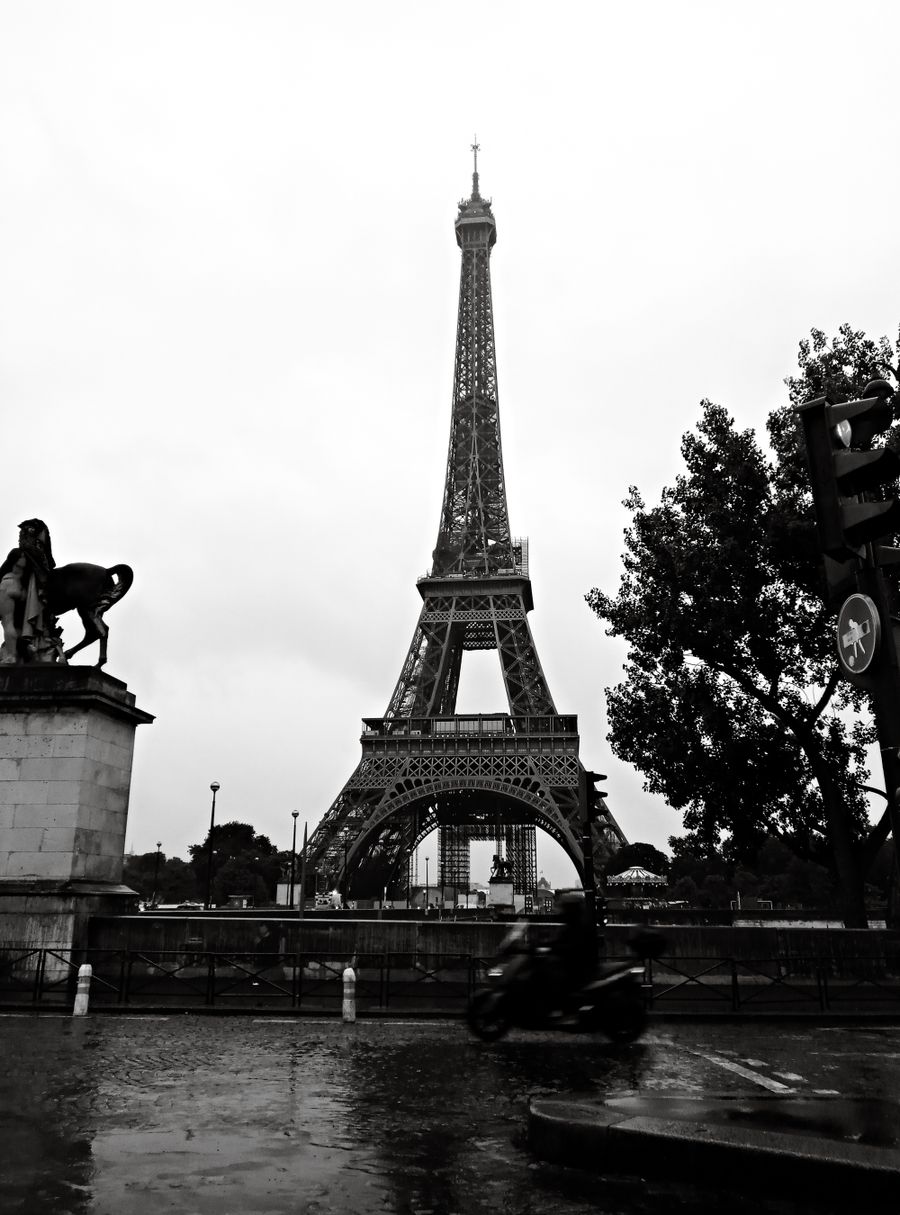 moody eiffel tower view on a rainy day — Low-Data Alert runs in your browser session — nothing sensitive stored against you.