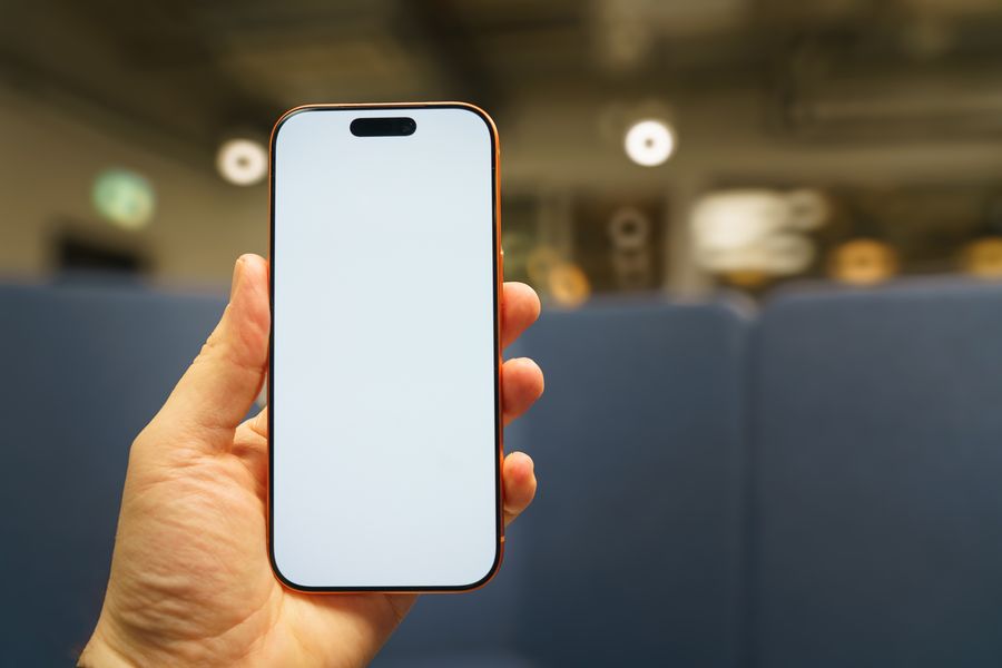 blank smartphone screen held in hand indoors — The spec grid shows exactly what Free Wi-Fi Finder accepts and what it returns.