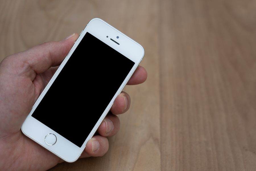 a smartphone with a black screen — Free Wi-Fi Finder links every answer onward — usually the plan it recommends.