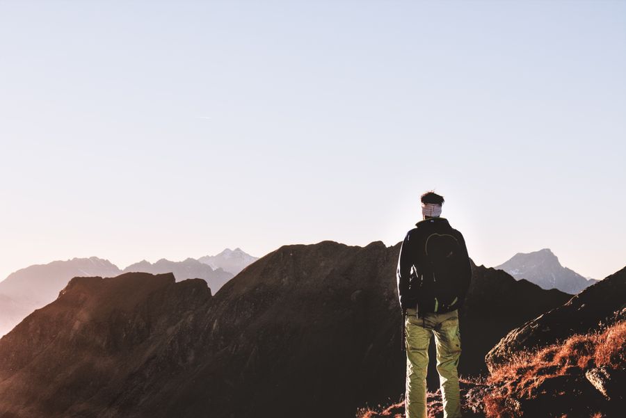 person standing on top of the mountain — eSIM Installation Guide runs in your browser session — nothing sensitive stored against you.