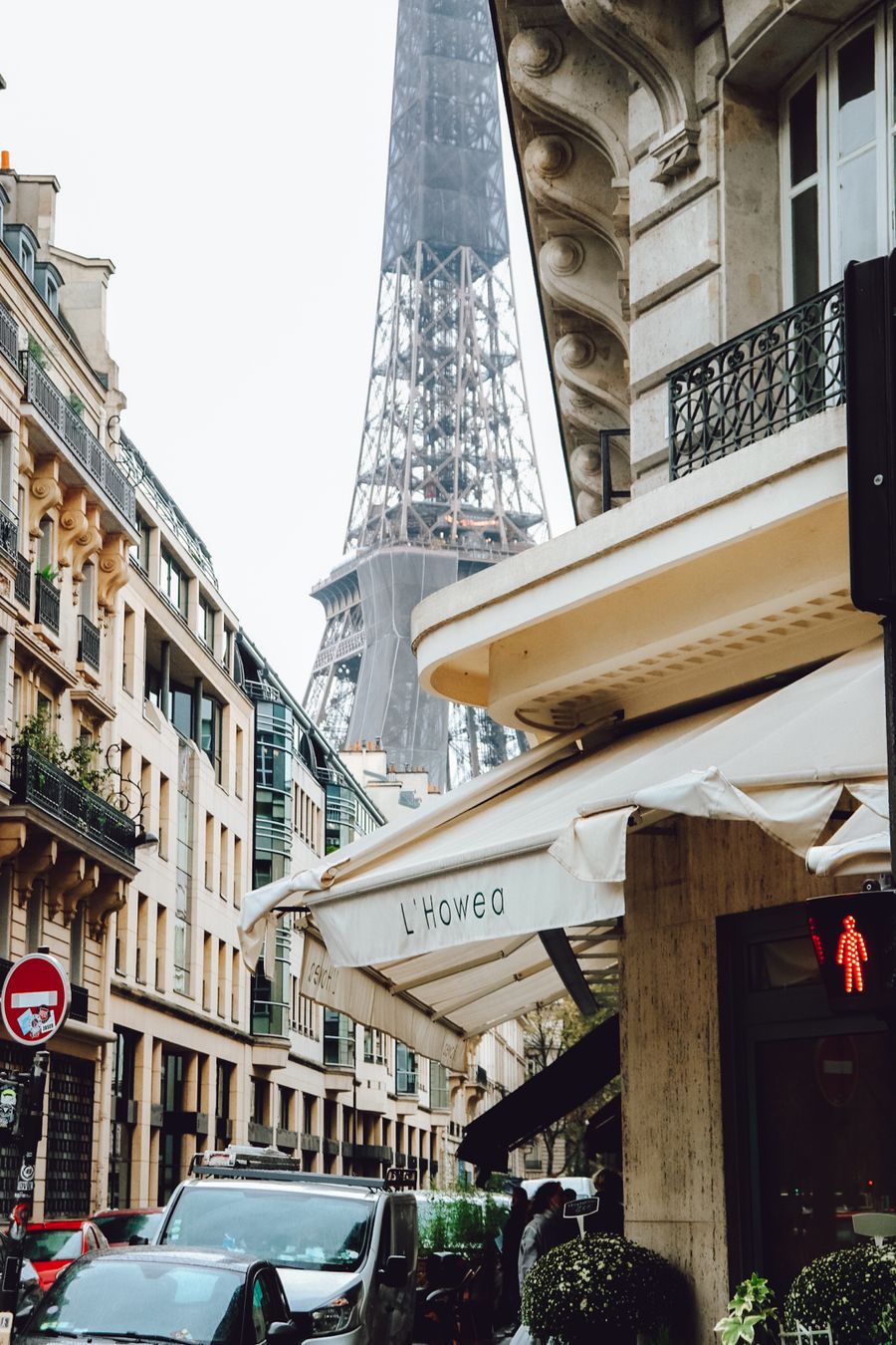 eiffel tower seen from alley in paris france