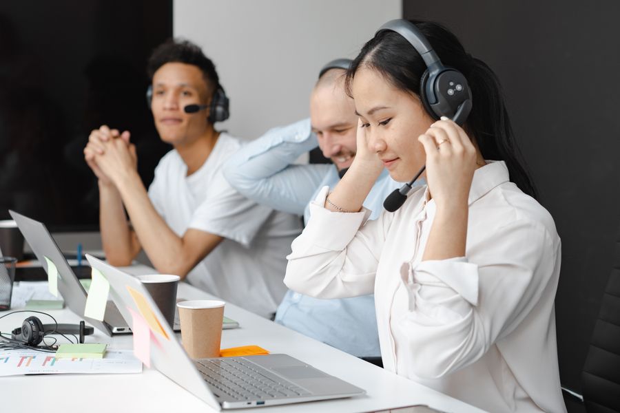 people working in a call center — The welcome home: eSIM deleted in one tap, no contract to cancel.