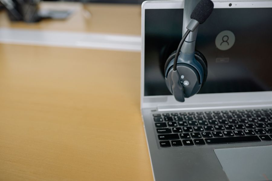 close up photo of headset on a laptop — How Much Speed Do You Need? works for anonymous visitors — answers first, signup never forced.